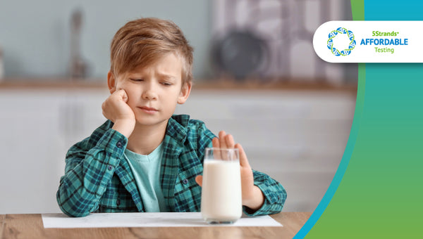 kid looking at milk glass wondering how intolerances are developed