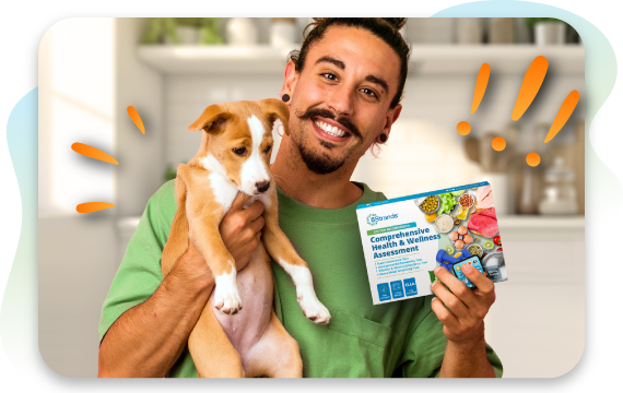 Man holding a puppy while displaying a pet health assessment test kit in a bright kitchen setting.