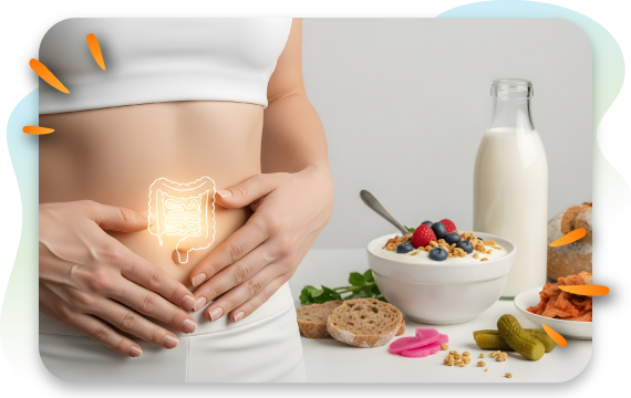 Woman holding stomach to represent gut health, with probiotic and digestive health foods on table.